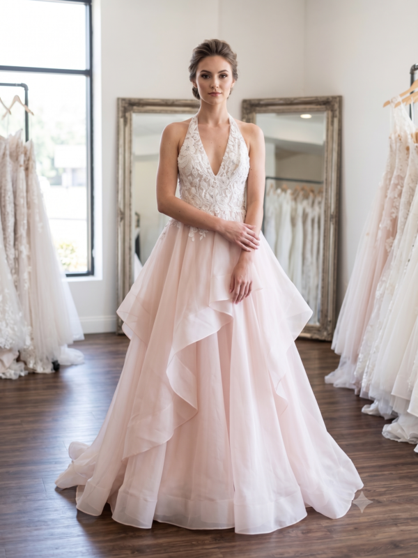 Front full-length view of the Private Label "Jess" A-line wedding dress in size 4, showcasing the halter neck bodice and cascading tiered blush organza skirt.