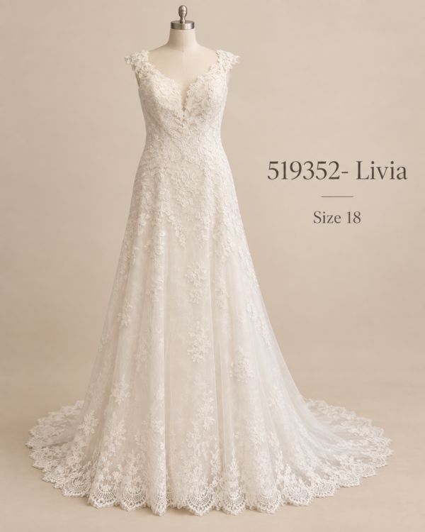 Front mannequin view of 519352-Livia size 18 ivory lace A-line wedding dress with V neckline