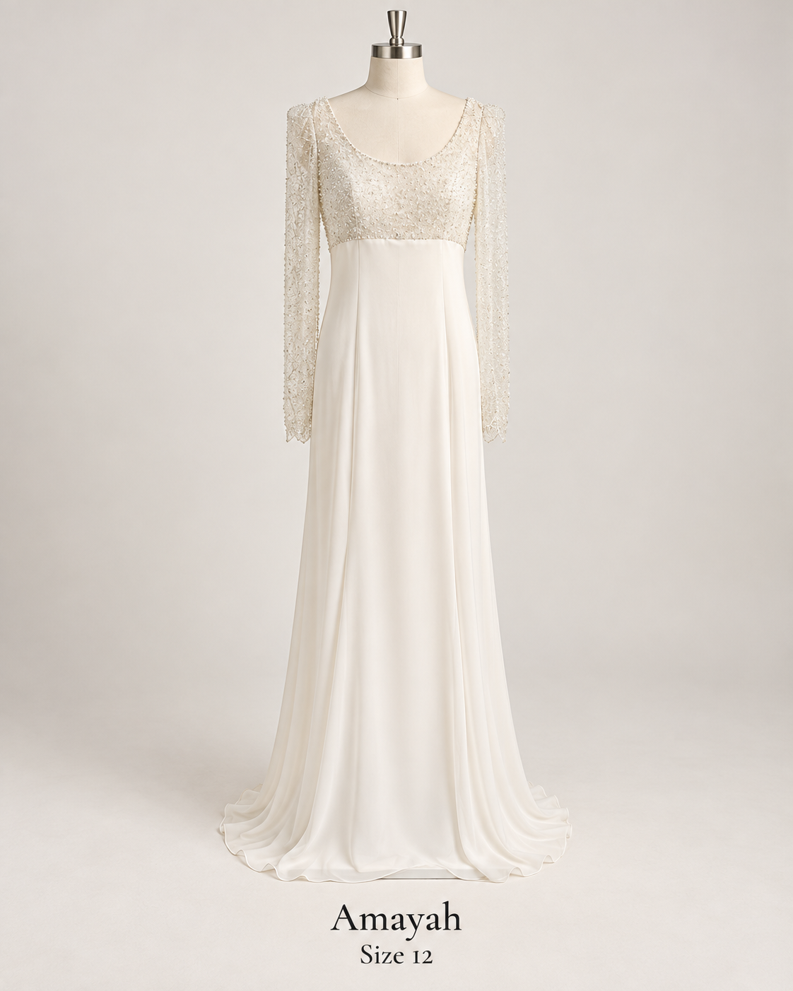 Front mannequin view of Amayah size 12 wedding dress with embellished bodice, long sleeves and flowing ivory skirt