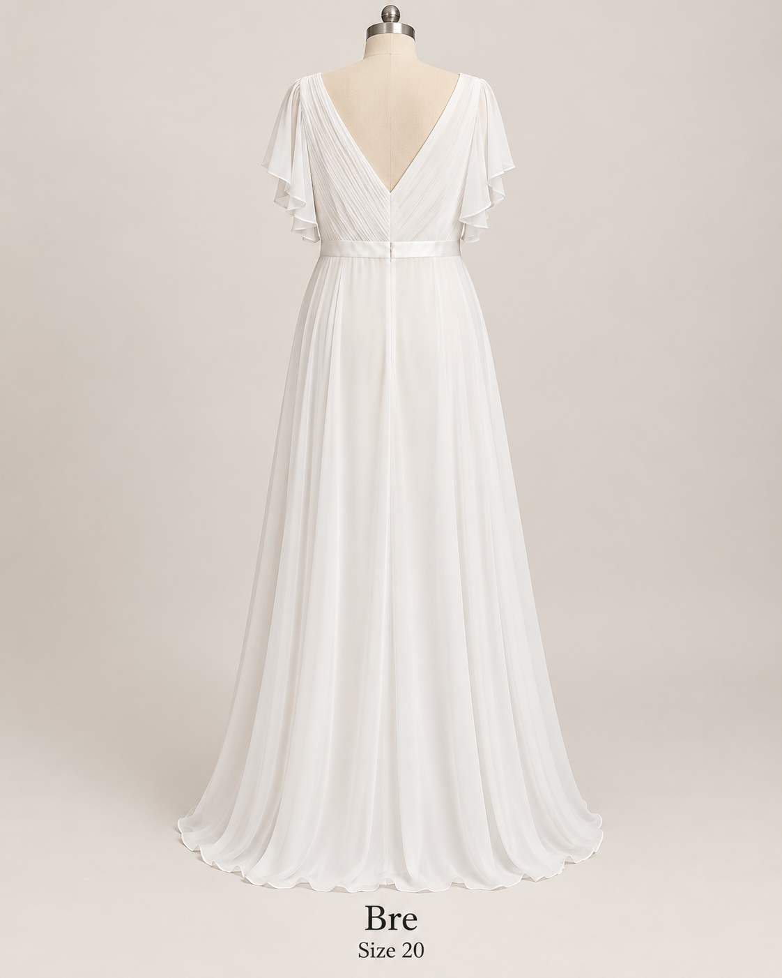 Back view of Bre size 20 wedding dress with V-back, flutter sleeves, defined waistband and flowing chiffon A-line skirt