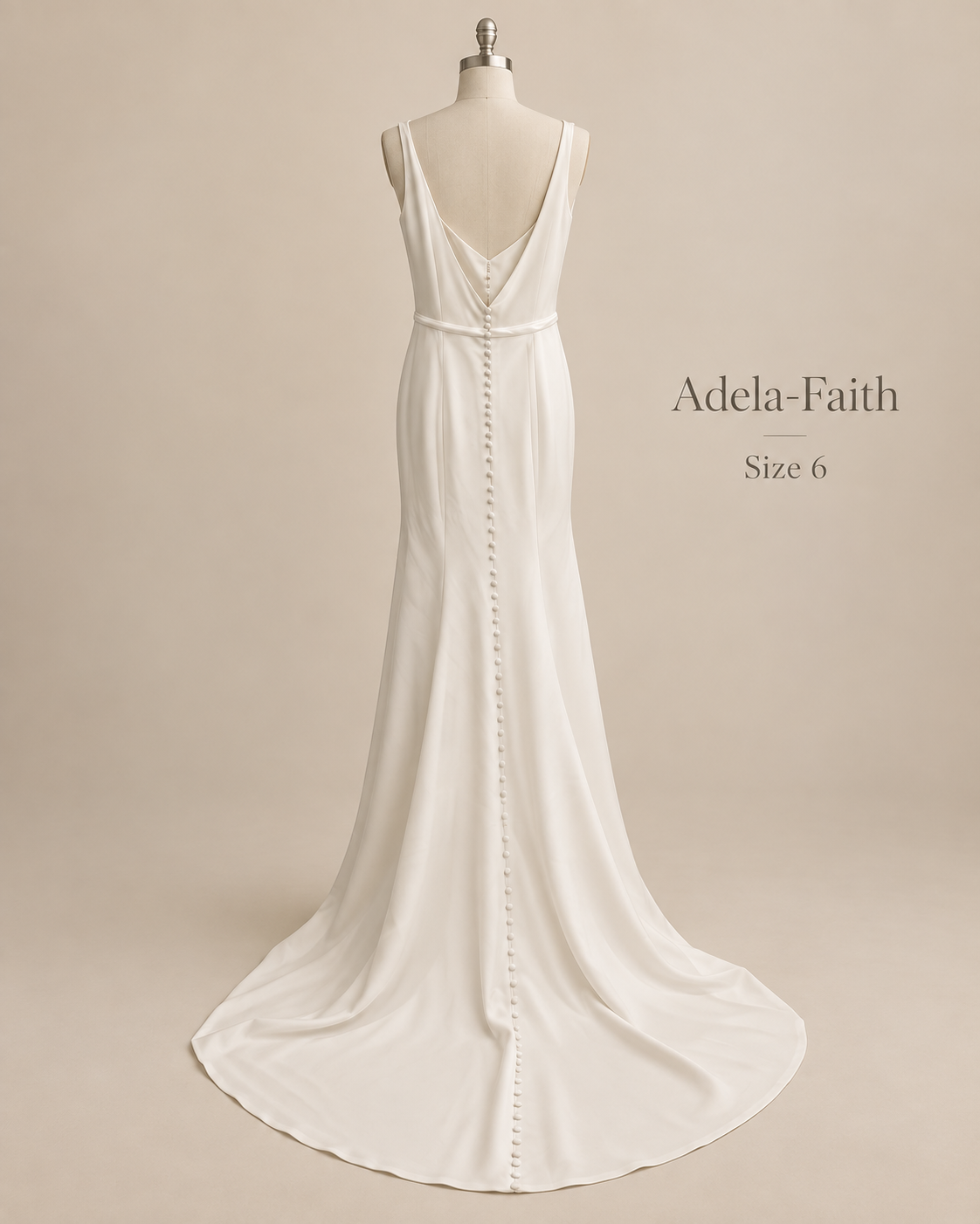 Back mannequin view of CLA-600109 Love size 6 satin wedding gown with deep draped V-back and covered buttons