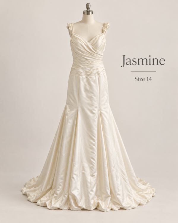 Front view of Jasmine size 14 wedding dress with V-neckline, ruched satin bodice, ruffled straps and trumpet skirt
