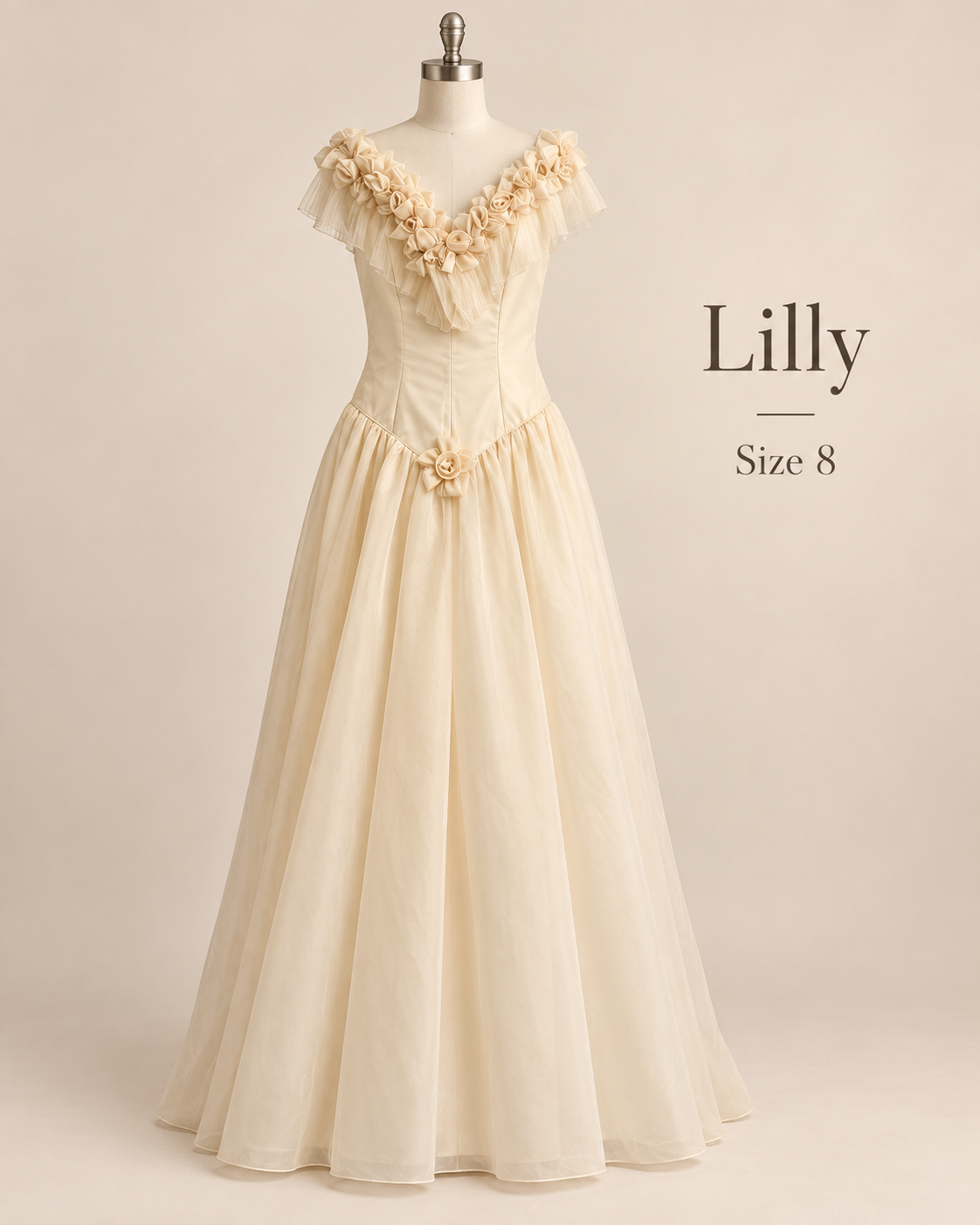 Front mannequin view of Lilly size 8 ivory wedding dress with off-the-shoulder floral neckline and full A-line skirt