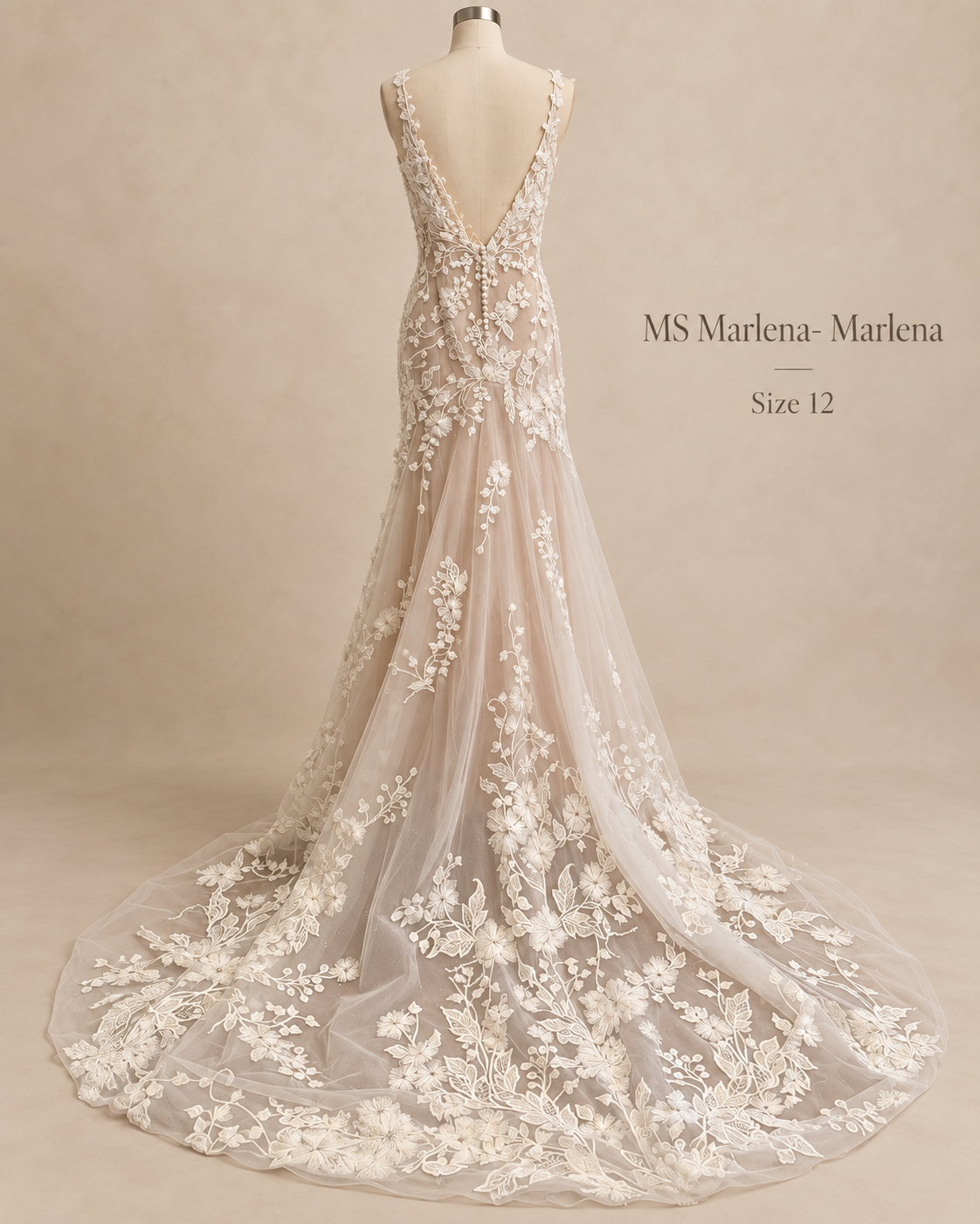 Back view of MS Marlena Marlena size 12 wedding dress with deep V-back, covered buttons and dramatic floral lace train