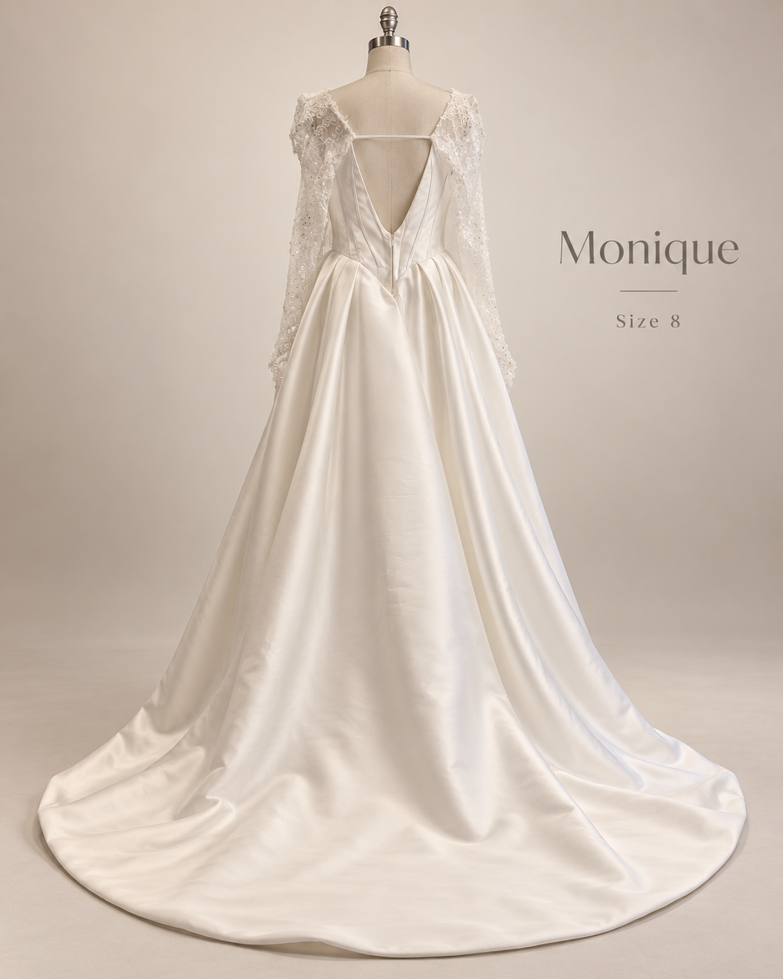 Back mannequin view of Monique size 8 wedding dress showing low back, corset detail, lace sleeves and sweeping satin train