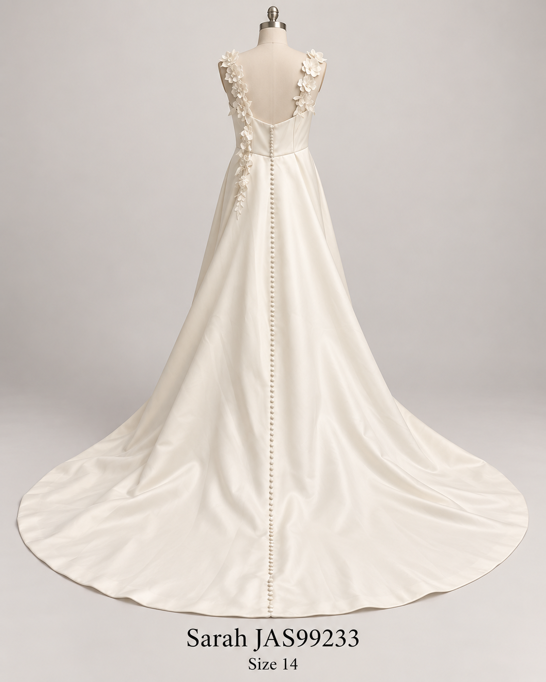 Back mannequin view of Sarah JAS99233 size 14 ivory satin wedding dress with floral straps, covered buttons and full train